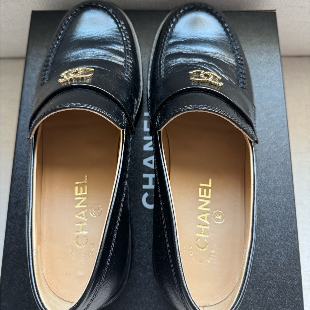 CHANEL Black Leather Loafers with Gold Accent